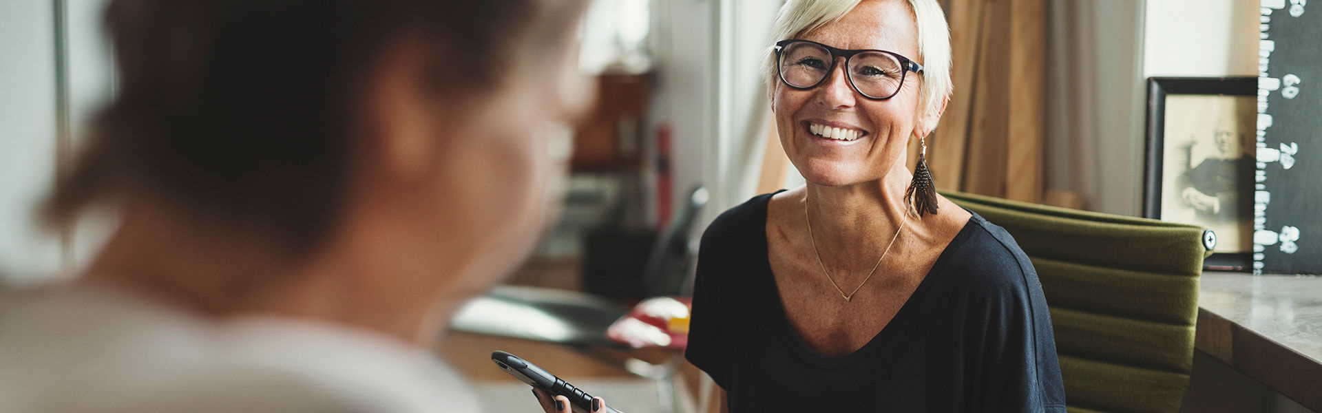 happy-woman-smiling-in-office-setting